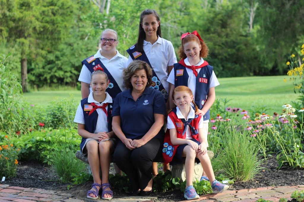 Patti Garibay surrounded by American Heritage Girls
