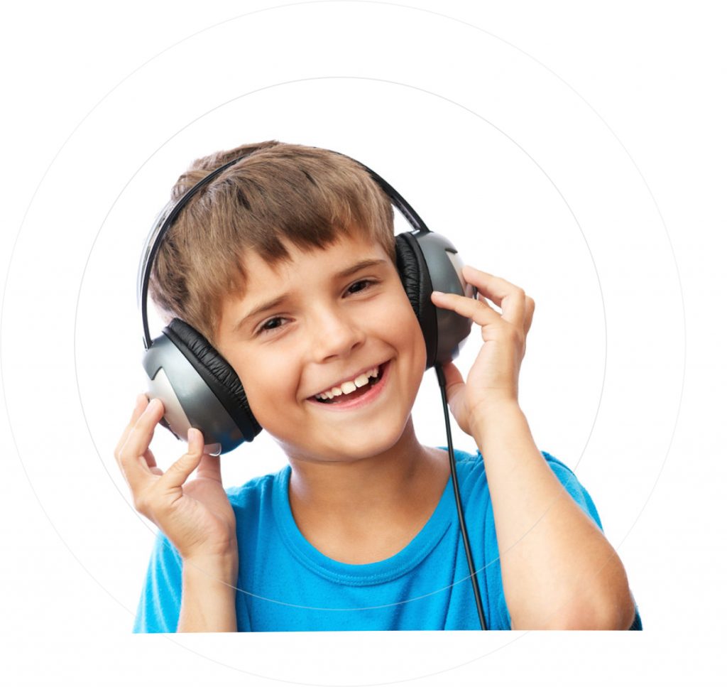 boy with headphones listening to Adventures in Odyssey